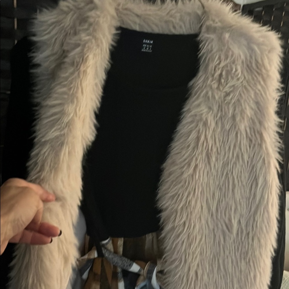 SHEIN Black/Plaid sweater dress
furry vest & suede boots for the perfect outfit